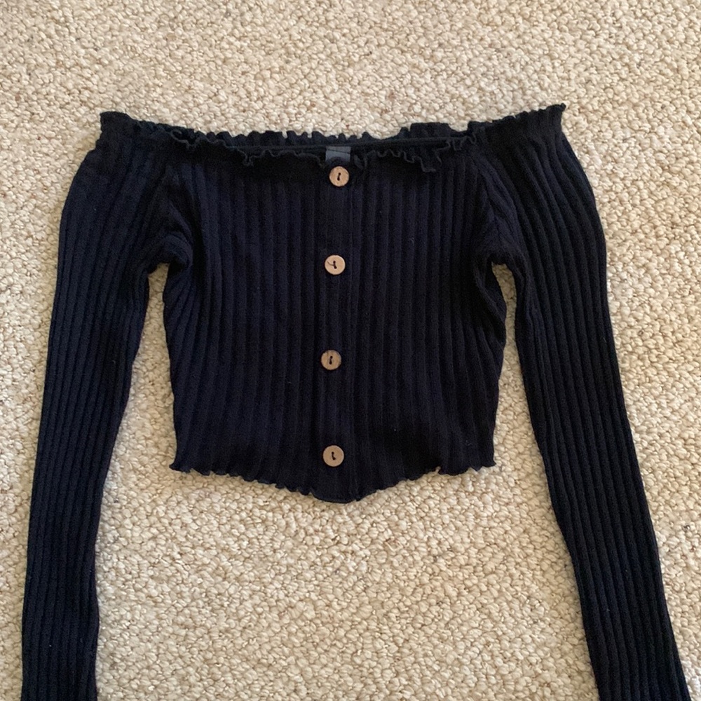 Off the shoulder, long sleeved ruffled cropped top with buttons